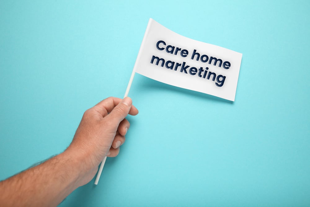 Flag with Care Home Marketing written on